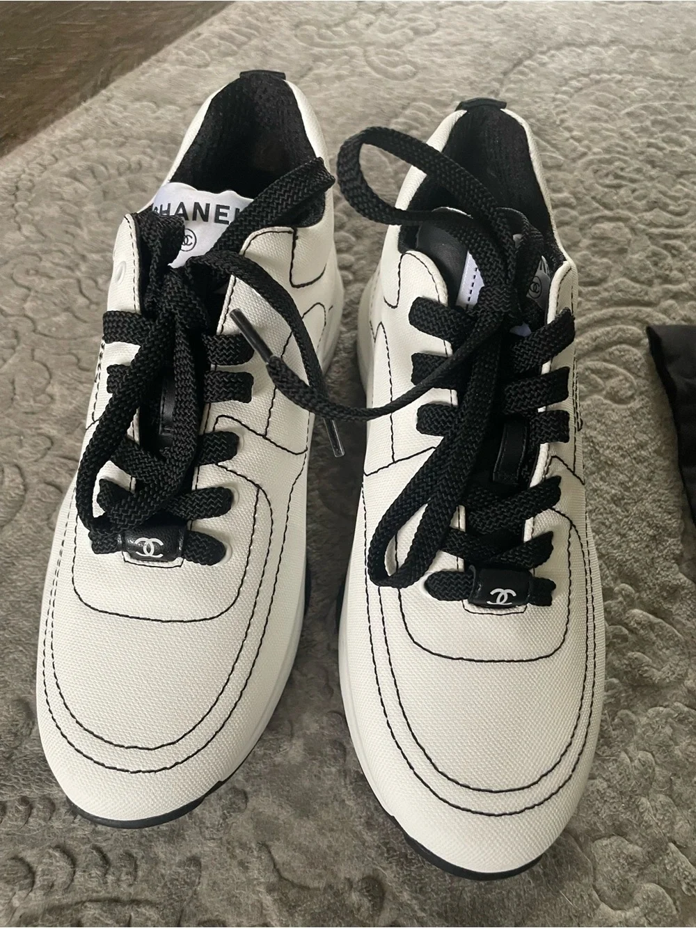 CHANEL White and Black Lace-Up Runner Sneakers
